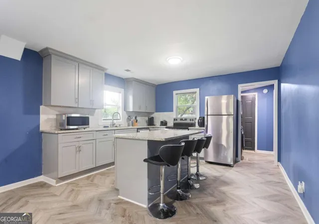 Photo 4 of Multi family home for sale at 537 W Lake Ave Nw, Atlanta, GA 30318 | MLS# 10807039 | Listing updated on 2026-09-20
