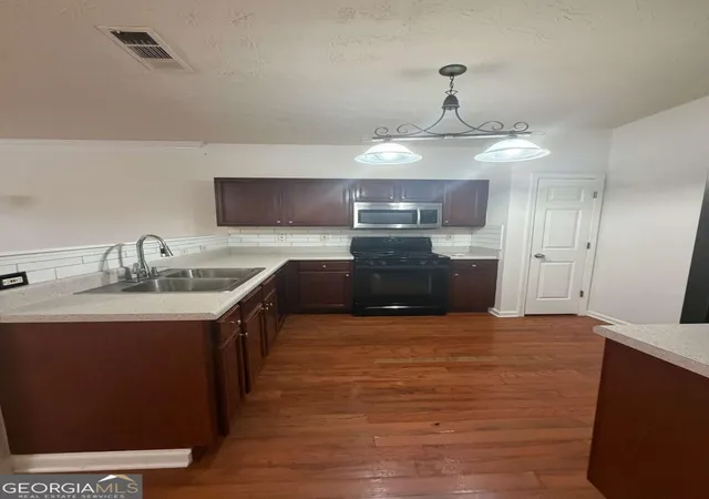 Photo 4 of Townhouse for sale at 325 Parc River Blvd, Lawrenceville, GA 30046 | MLS# 10809748 | Listing updated on 2026-09-04