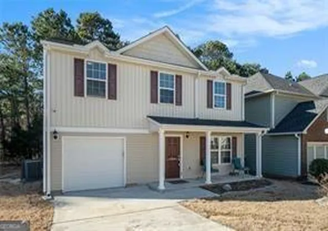 Photo 2 of Single family home for sale at 5987 Westchase St, Atlanta, GA 30336 | MLS# 10542427 | Listing updated on 2026-01-08