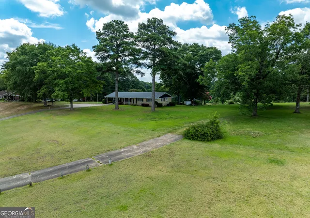 Photo 2 of Land for sale at 7359 Pleasant Hl Rd, Lithonia, GA 30058 | MLS# 10799375 | Listing updated on 2026-07-29
