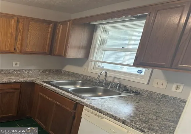 Photo 2 of Townhouse for sale at 2136 Wellington Cir, Lithonia, GA 30058 | MLS# 10834725 | Listing updated on 2026-09-15
