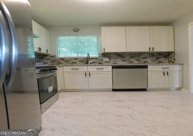 Photo 4 of Single family home for sale at 6740 Cambridge Dr, Rex, GA 30273 | MLS# 10817365 | Listing updated on 2026-09-07