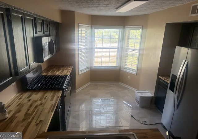 Photo 1 of Condo for sale at 9472 Cypress Ln, Jonesboro, GA 30238 | MLS# 10872282 | Listing updated on 2026-10-27