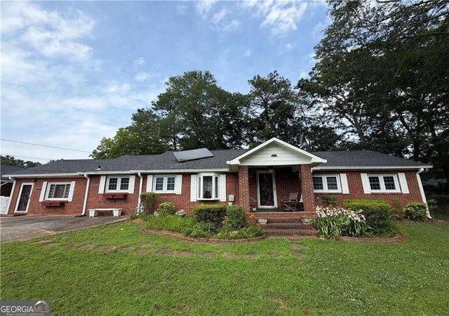 1st image of 401 Latimore Ave, Buford, GA 30518 | MLS# 10829506