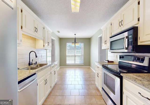 Photo 4 of Single family home for sale at 1128 Bartlett Dr, Statesboro, GA 30461 | MLS# 10822209 | Listing updated on 2026-10-07