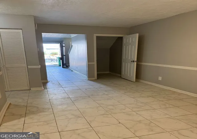 Photo 3 of Townhouse for sale at 5597 Stonington Tr Pkwy, Stone Mountain, GA 30087 | MLS# 10783450 | Listing updated on 2026-09-10