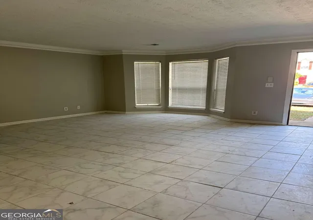 Photo 4 of Townhouse for sale at 5597 Stonington Tr Pkwy, Stone Mountain, GA 30087 | MLS# 10783450 | Listing updated on 2026-09-10