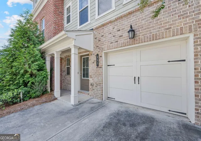 Photo 3 of Townhouse for sale at 211 Mahone Dr, Lilburn, GA 30047 | MLS# 10809896 | Listing updated on 2026-09-23