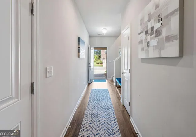 Photo 4 of Townhouse for sale at 211 Mahone Dr, Lilburn, GA 30047 | MLS# 10809896 | Listing updated on 2026-09-23