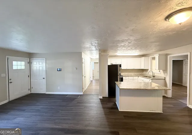 Photo 4 of Single family home for sale at 423 Belgarde Pl SE, Atlanta, GA 30354 | MLS# 10830253 | Listing updated on 2026-10-06
