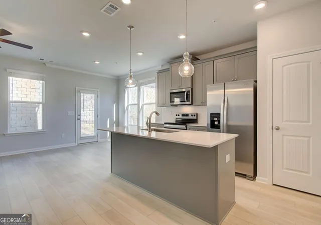 Photo 3 of Townhouse for sale at 8110 Tiger Way, Riverdale, GA 30296 | MLS# 10776017 | Listing updated on 2026-10-26