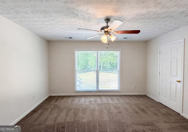 Photo 3 of Single family home for sale at 213 Carl Parker Rd, Hampton, GA 30228 | MLS# 10735984 | Listing updated on 2026-10-02