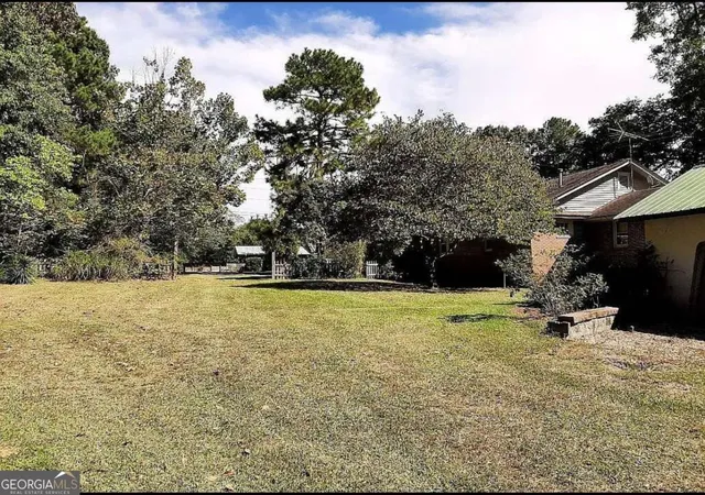 Photo 2 of Single family home for sale at 12871 Panhandle Rd, Hampton, GA 30228 | MLS# 10808492 | Listing updated on 2026-08-01