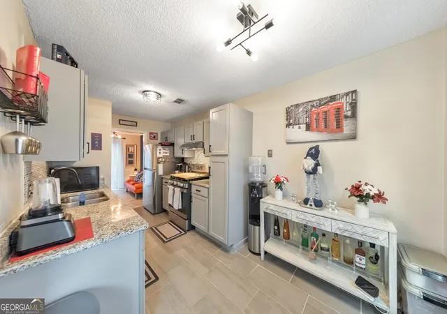 Photo 3 of Townhouse for sale at 1688 Grist Ml Dr, Marietta, GA 30062 | MLS# 10796763 | Listing updated on 2026-08-20