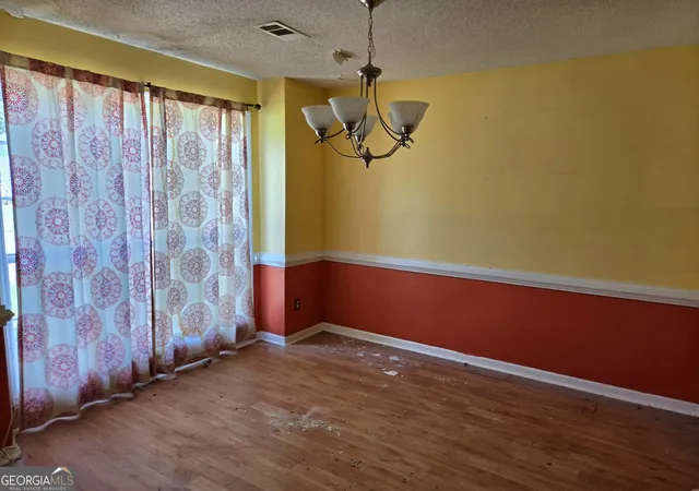Photo 3 of Single family home for sale at 309 Madison Ave, Hampton, GA 30228 | MLS# 10829616 | Listing updated on 2026-09-04