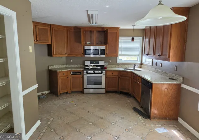 Photo 3 of Single family home for sale at 309 Madison Ave, Hampton, GA 30228 | MLS# 10829616 | Listing updated on 2026-09-04