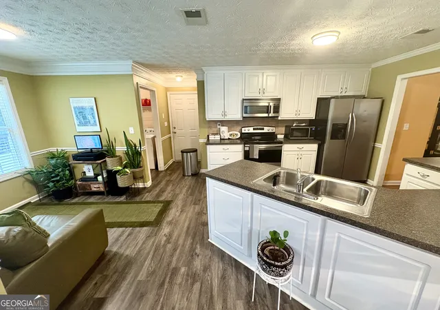 Photo 2 of Single family home for sale at 20 Clarion Court, Covington, GA 30016 | MLS# 10581516 | Listing updated on 2025-12-13