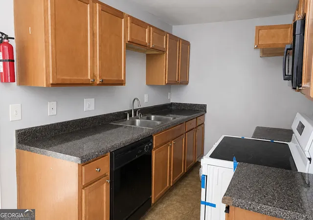 Photo 3 of Townhouse for sale at 1660 Stanton #3E, Atlanta, GA 30311 | MLS# 10835518 | Listing updated on 2026-09-11