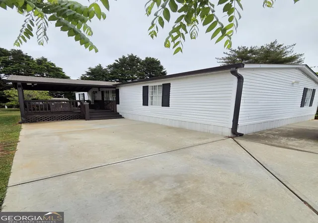 Photo 1 of Manufactured home for sale at 4855 Peachtree Dr, Buford, GA 30518 | MLS# 10742871 | Listing updated on 2026-05-04