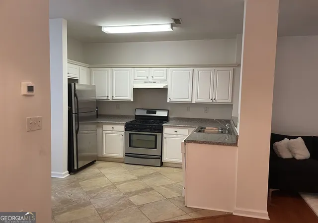 Photo 2 of Townhouse for sale at 844 Biltmore Ct, Lithonia, GA 30058 | MLS# 10810212 | Listing updated on 2026-08-24