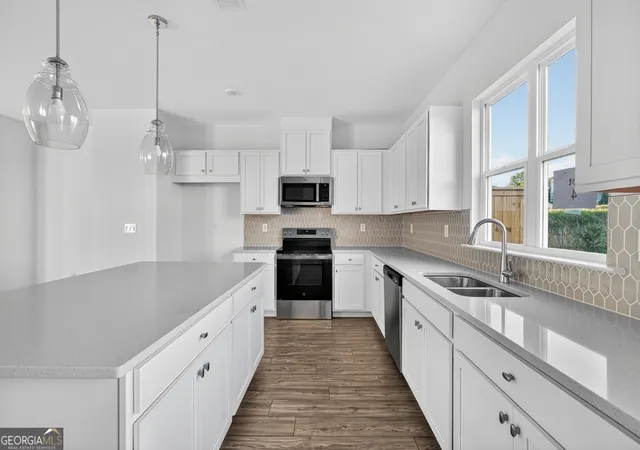Photo 2 of Townhouse for sale at 100 Epperly Way, Tucker, GA 30084 | MLS# 10768578 | Listing updated on 2026-09-18