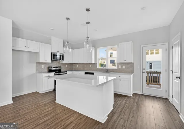 Photo 3 of Townhouse for sale at 100 Epperly Way, Tucker, GA 30084 | MLS# 10768578 | Listing updated on 2026-09-18