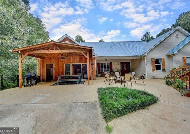 Photo 3 of Single family home for sale at 5405 Oak Grove Cir, Cumming, GA 30028 | MLS# 10829032 | Listing updated on 2026-09-02