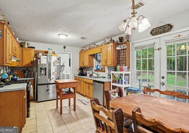Photo 3 of Single family home for sale at 205 Woodcrest Dr, Covington, GA 30016 | MLS# 10620411 | Listing updated on 2026-08-13