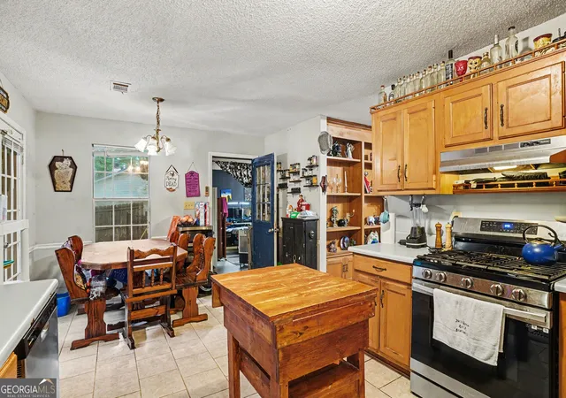 Photo 3 of Single family home for sale at 205 Woodcrest Dr, Covington, GA 30016 | MLS# 10620411 | Listing updated on 2026-08-13