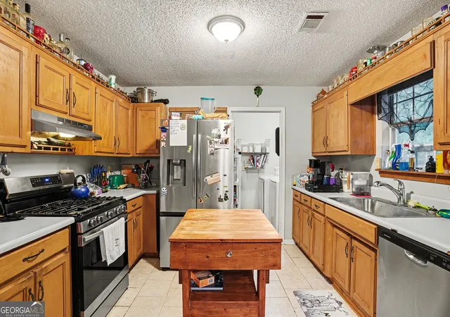 Photo 4 of Single family home for sale at 205 Woodcrest Dr, Covington, GA 30016 | MLS# 10620411 | Listing updated on 2026-08-13