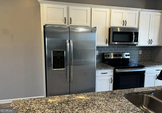 Photo 3 of Townhouse for sale at 3627 Hawthorne Ter, Atlanta, GA 30337 | MLS# 10730782 | Listing updated on 2026-10-30