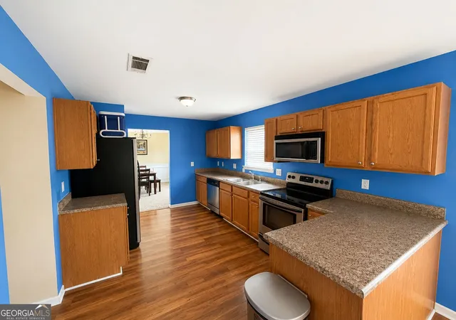 Photo 4 of Single family home for sale at 1933 Wilson Manor Cir, Lawrenceville, GA 30045 | MLS# 10828739 | Listing updated on 2026-09-10