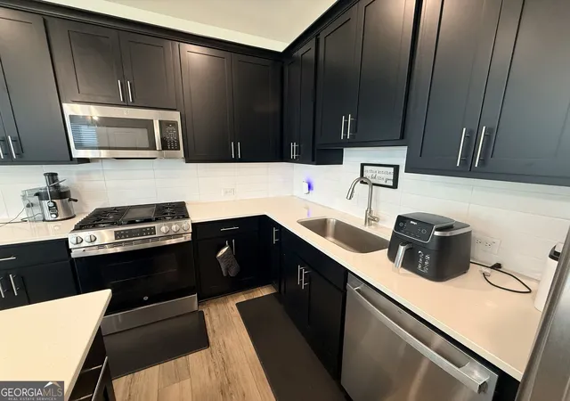 Photo 3 of Townhouse for sale at 1623 Gunnin Tr Nw, Atlanta, GA 30318 | MLS# 10832944 | Listing updated on 2026-10-24