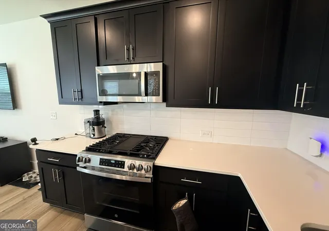 Photo 4 of Townhouse for sale at 1623 Gunnin Tr Nw, Atlanta, GA 30318 | MLS# 10832944 | Listing updated on 2026-10-24