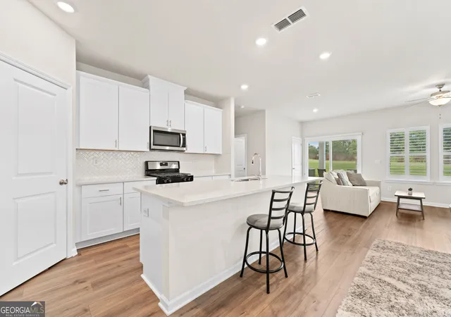 Photo 3 of Townhouse for sale at 1752 Villageside Ct, Lawrenceville, GA 30043 | MLS# 10829275 | Listing updated on 2026-09-03