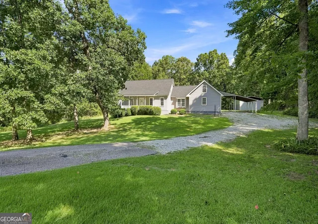 Photo 2 of Single family home for sale at 1423 Enchanted Lake Dr Nw, Conyers, GA 30012 | MLS# 10829150 | Listing updated on 2026-09-02