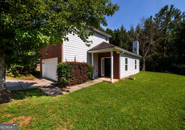 Photo 2 of Single family home for sale at 6550 Browns Mill Ferry Dr, Lithonia, GA 30038 | MLS# 10822239 | Listing updated on 2026-08-22