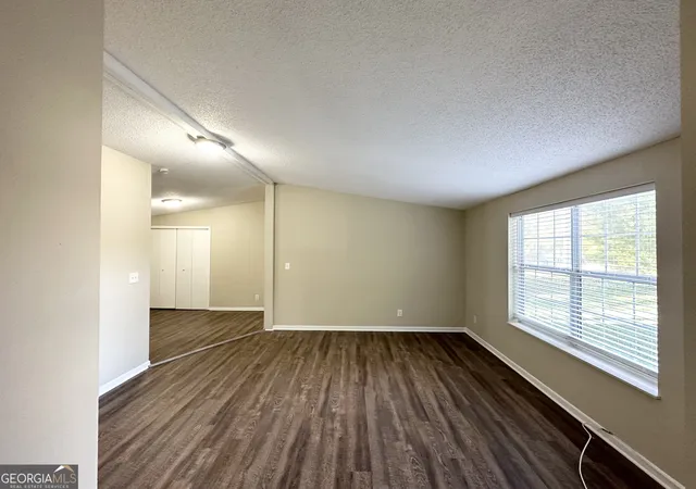 Photo 3 of Single family home for sale at 7125 Rhodes St, Lithonia, GA 30058 | MLS# 10418834 | Listing updated on 2026-09-21