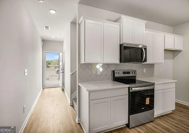 Photo 3 of Townhouse for sale at 202 Sound Cir, Stockbridge, GA 30281 | MLS# 10773654 | Listing updated on 2026-09-23