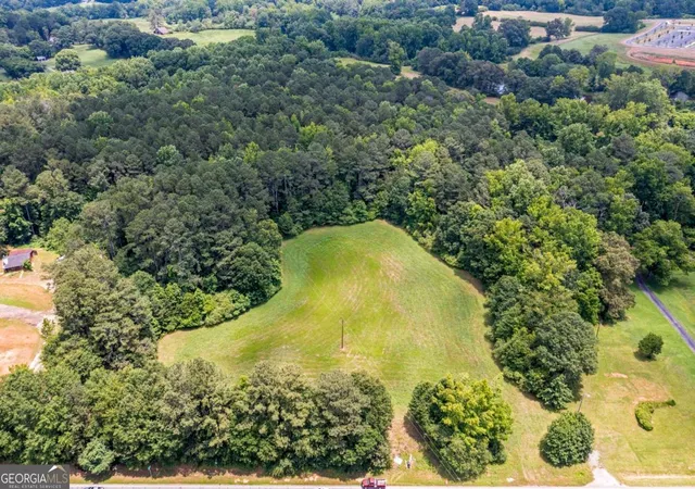 Photo 2 of Land for sale at 00 Cumming Hwy, Canton, GA 30115 | MLS# 10552075 | Listing updated on 2026-08-11