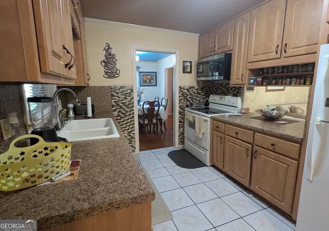 Photo 4 of Single family home for sale at 3760 Sulene Dr SW, Atlanta, GA 30349 | MLS# 10835942 | Listing updated on 2026-09-15