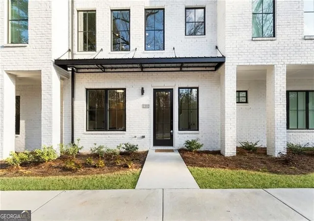 Photo 1 of Townhouse for sale at 2202 Carlton Ct, Atlanta, GA 30318 | MLS# 10707129 | Listing updated on 2026-08-05