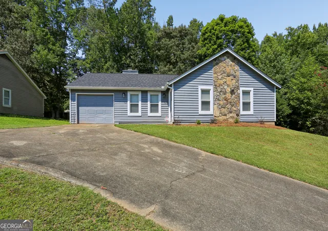 Single family home for sale at 1050 Chapman Cir, Stone Mountain, GA 30088 | MLS# 10825380