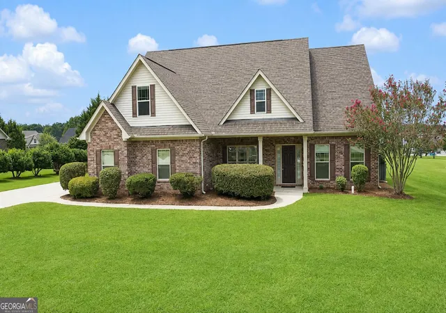 Photo 3 of Single family home for sale at 124 Magnolia Farms Dr, Milner, GA 30257 | MLS# 10828207 | Listing updated on 2026-10-06
