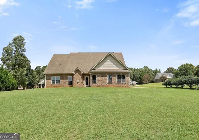 Photo 4 of Single family home for sale at 124 Magnolia Farms Dr, Milner, GA 30257 | MLS# 10828207 | Listing updated on 2026-10-06