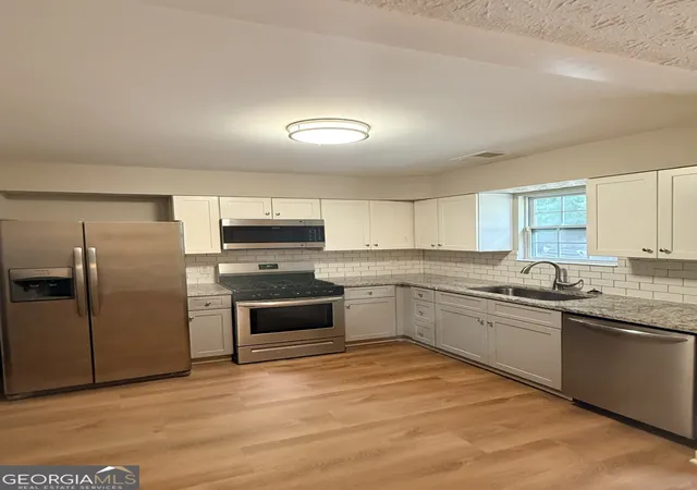 Photo 4 of Townhouse for sale at 3582 Hopkins Ct, Powder Springs, GA 30127 | MLS# 10808603 | Listing updated on 2026-10-09