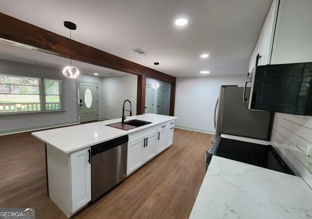 Photo 4 of Single family home for sale at 718 Springlake Rd, Lawrenceville, GA 30045 | MLS# 10760832 | Listing updated on 2026-10-28