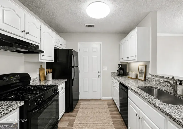 Photo 4 of Single family home for sale at 1382 N Hampton Dr, Hampton, GA 30228 | MLS# 10757047 | Listing updated on 2026-08-10