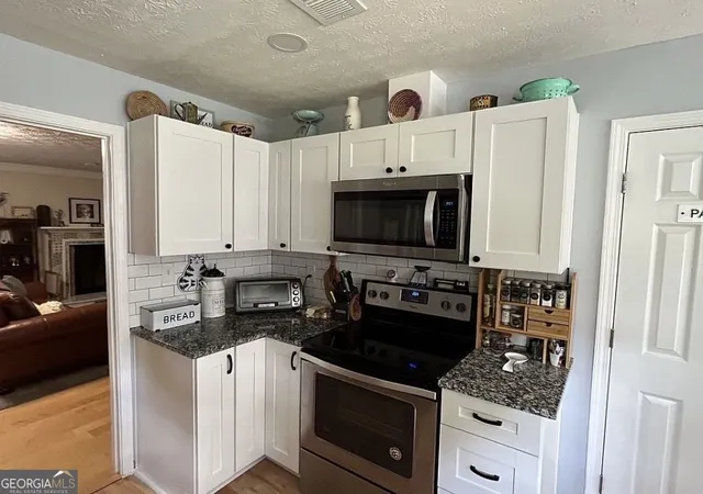 Photo 3 of Condo for sale at 6420 Windsor Trace Dr #6420, Peachtree Corners, GA 30092 | MLS# 10795038 | Listing updated on 2026-09-10