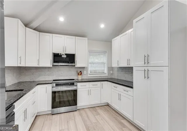 Photo 2 of Single family home for sale at 1966 Mark Trl, Decatur, GA 30032 | MLS# 10833503 | Listing updated on 2026-09-03